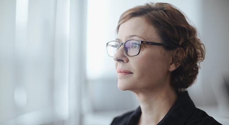 Businesswoman looking ahead in business office