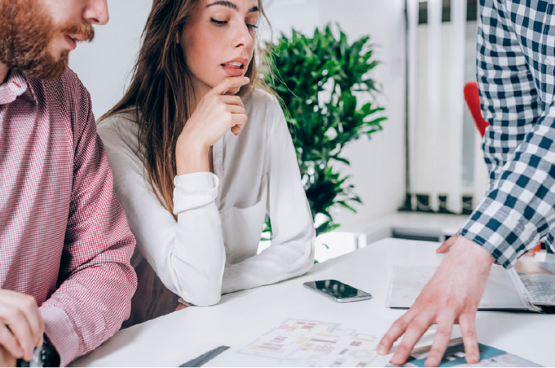 Couple looking at home layouts